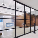 Space Reconfiguration using sliding stacking walls, swing doors, fixed panels | Acxiom Corporate Headquarters | Wide Opening Without Tracks on the Floor | Architect: Amy Lopez-Cepero Architects