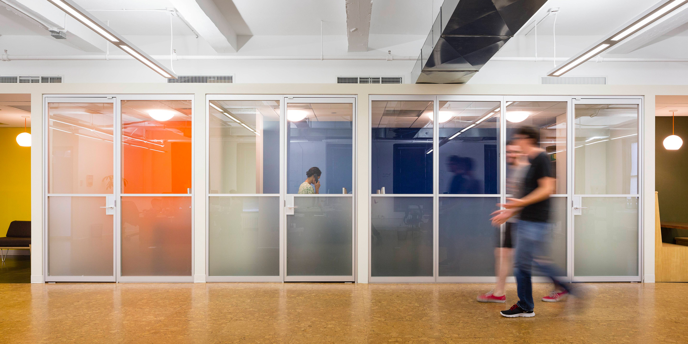 Harvest office: Swing doors and fixed panels helped designers with flexible space configurations while also maximizing light and transparency.