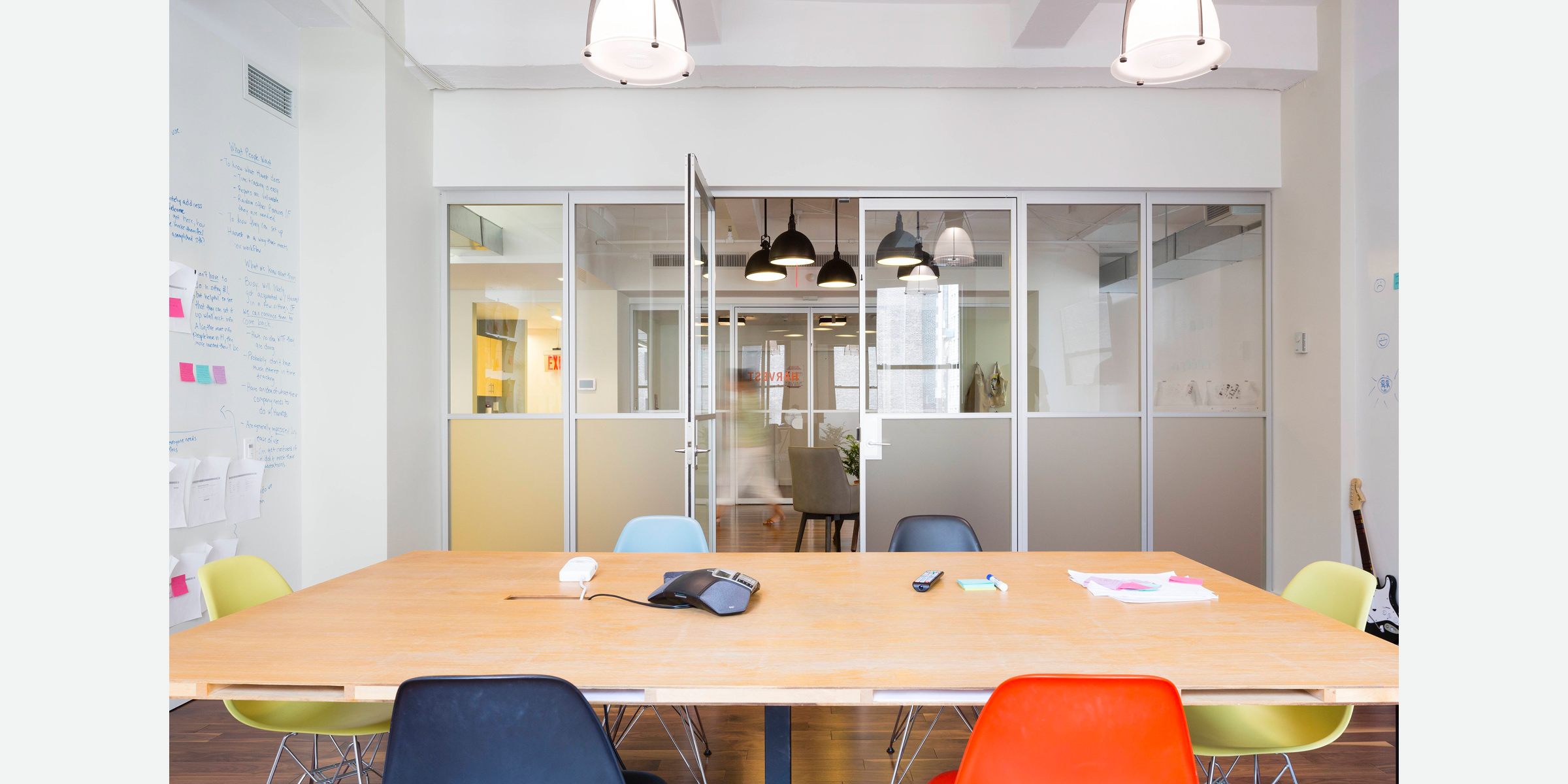 Harvest office: Swing doors and fixed panels helped designers with flexible space configurations while also maximizing light and transparency.