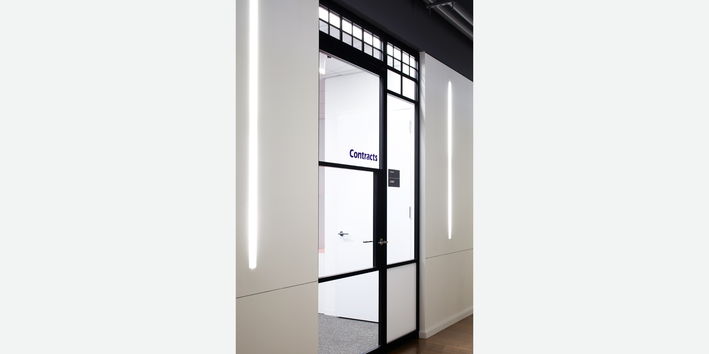32BJ Service Employees International Union | New York City | Architect: Gerner Kronick + Valcarcel | Swing Doors, Fixed Panels