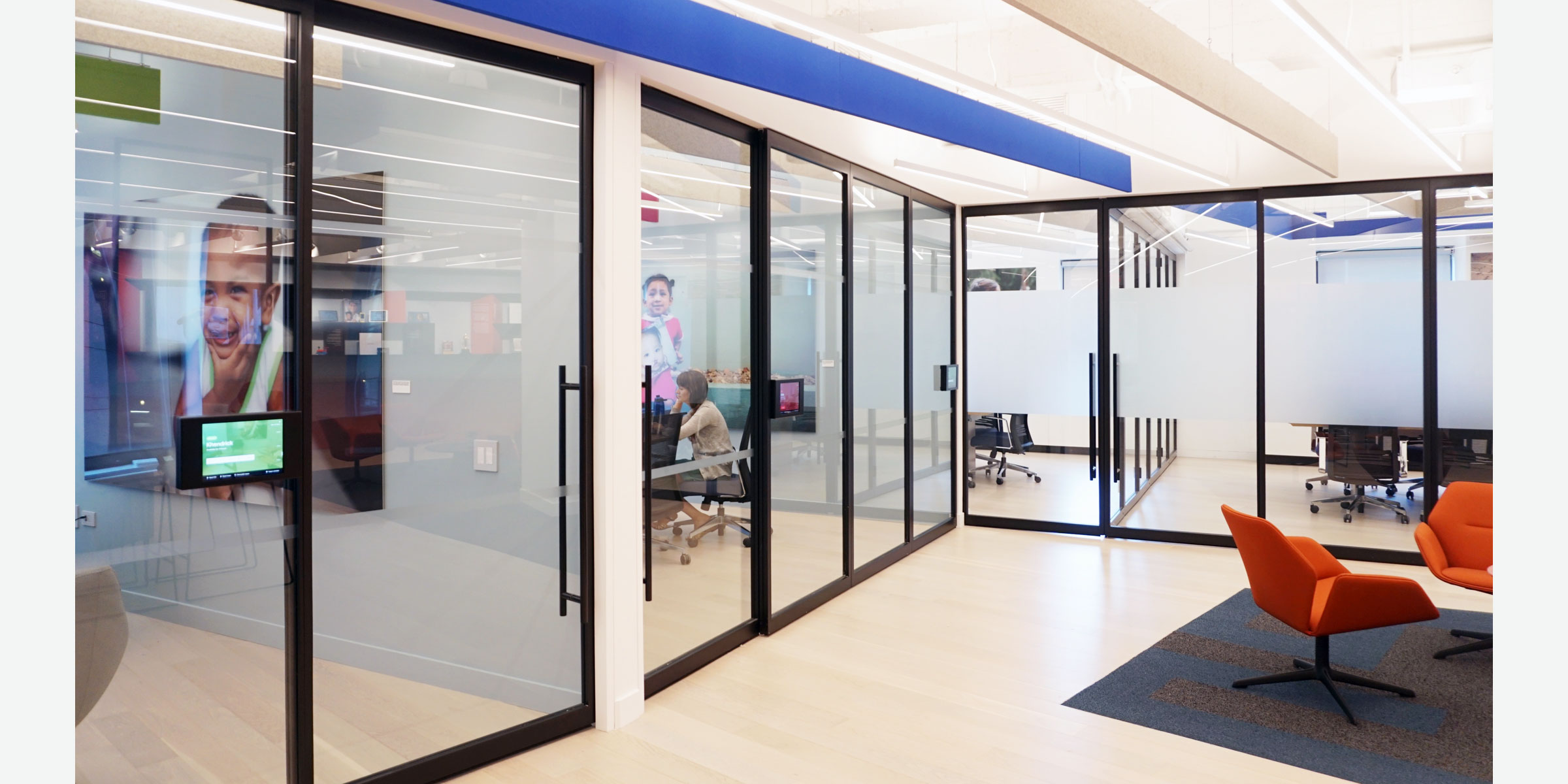 Smile Train New World Headquarters | New York City | Architect: Jattuso Architecture PLLC | Sliding Doors, Fixed Panels, Swing Doors, Bi-folding Wall