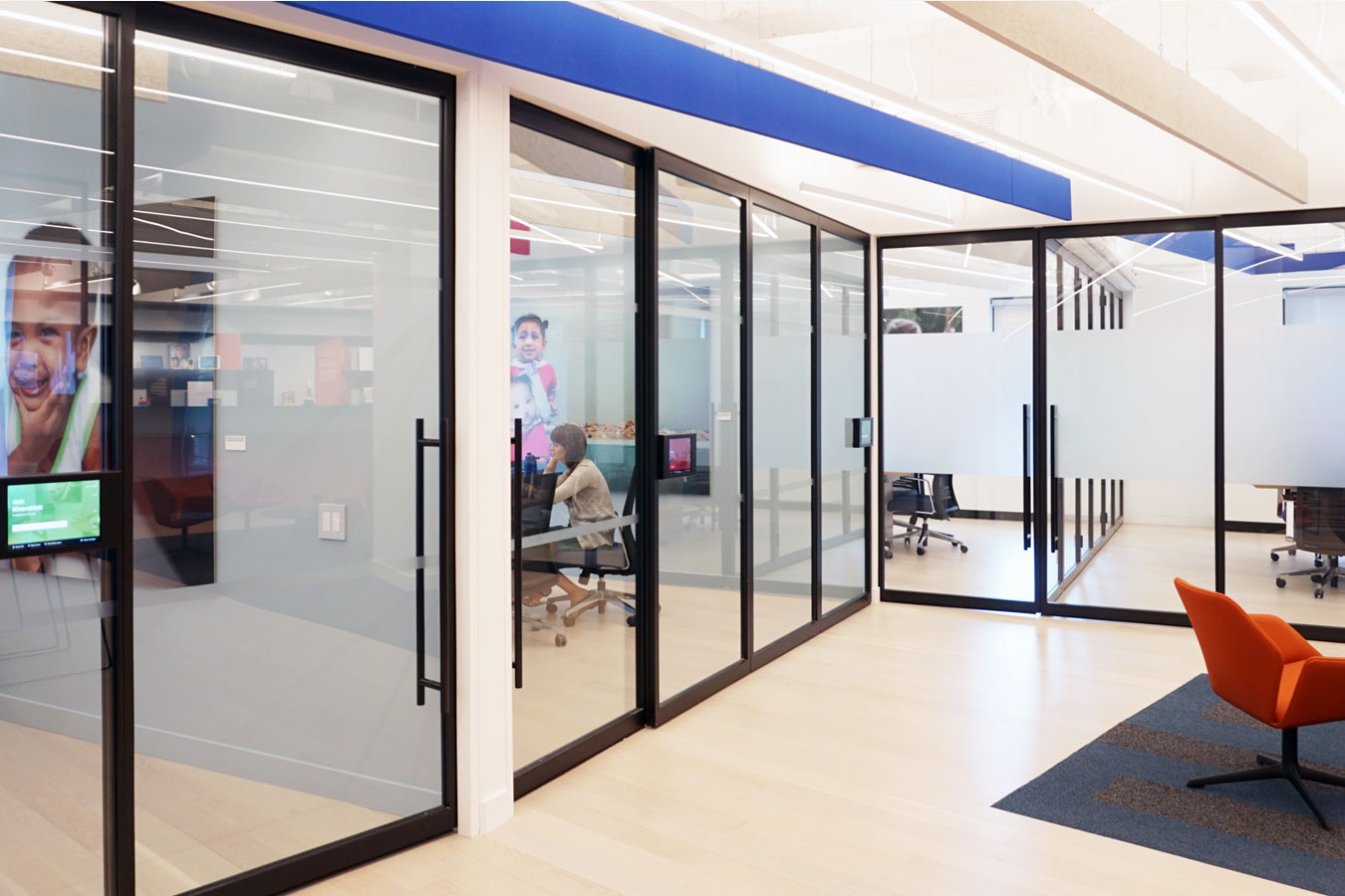 Smile Train New World Headquarters | New York City | Architect: Jattuso Architecture PLLC | Sliding Doors, Fixed Panels, Swing Doors, Bi-folding Wall